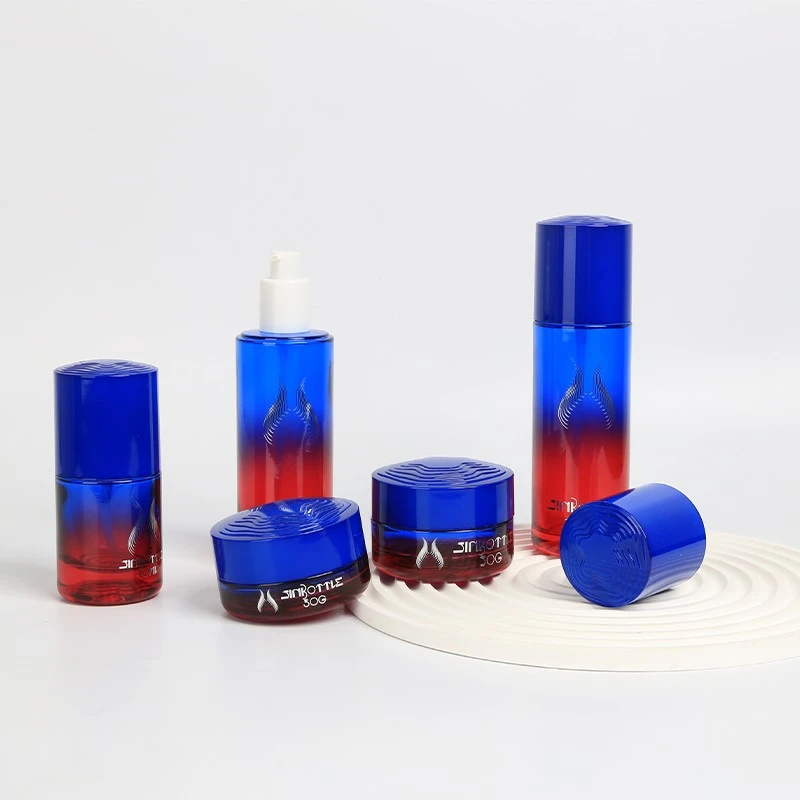 Custom Luxury Gradient Blue And Red Glass Cosmetic Packaging Set Lotion Bottle Cream Jar For High End Skincare Brands high quality